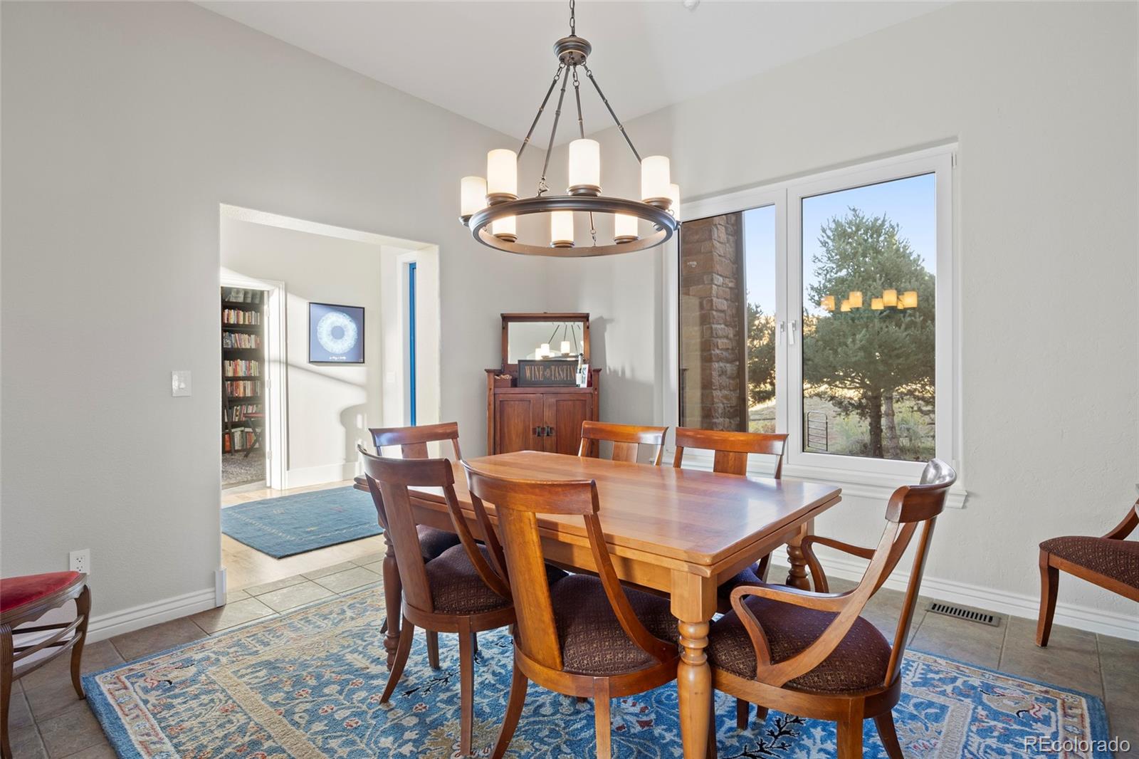 3532 Bell Mountain Drive Castle Rock, CO 80104 - Photo 18 of 50 a view of a dining room with furniture window and outside view