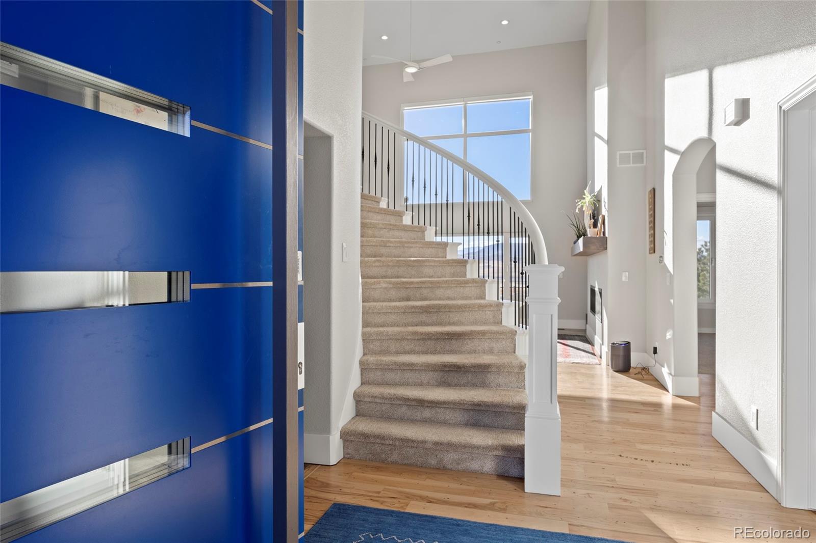 3532 Bell Mountain Drive Castle Rock, CO 80104 - Photo 8 of 50 a view of entryway with wooden floor