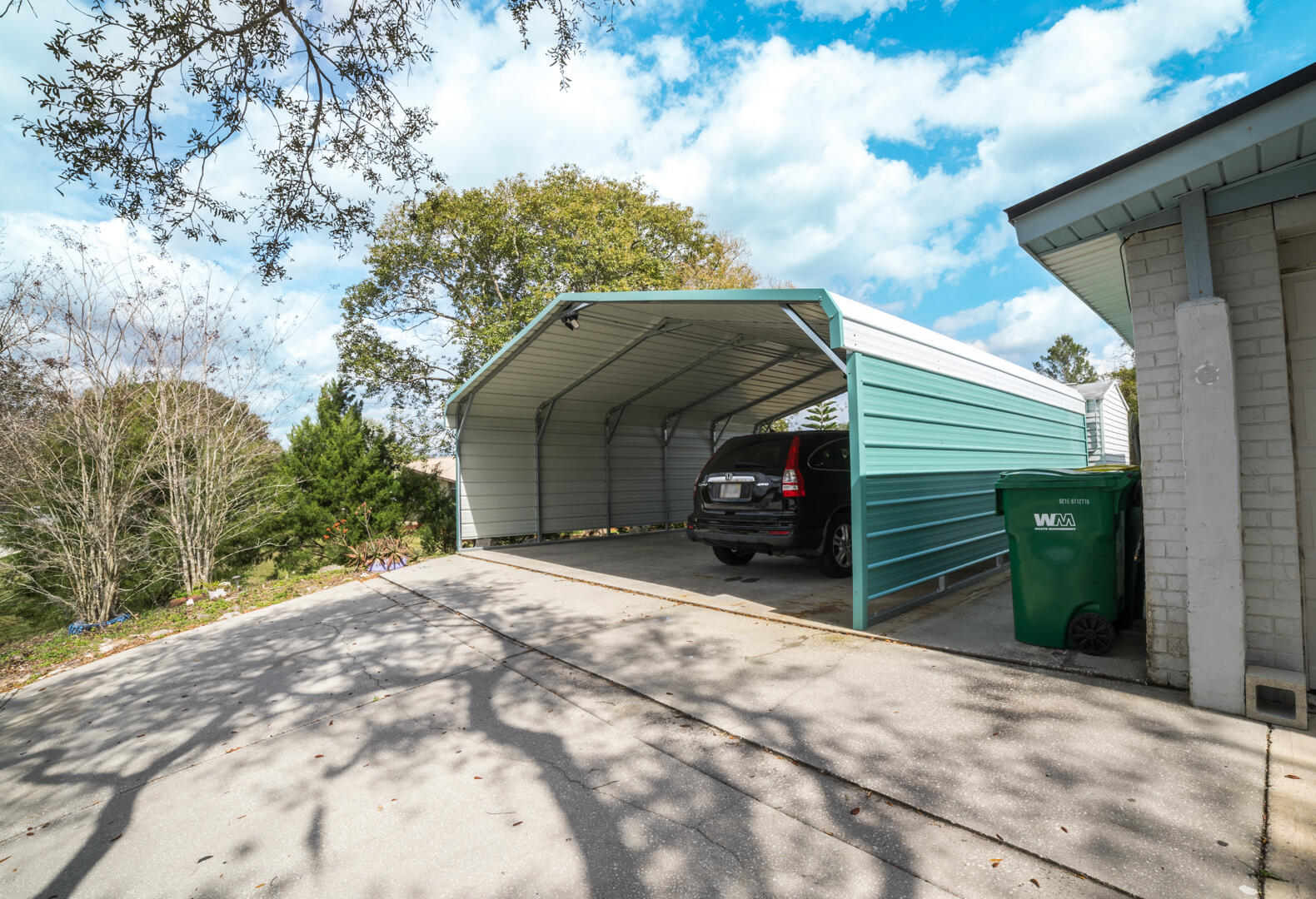 2289 Holder Road Mims, FL 32754 - Photo 16 of 17 a view of a house with a yard