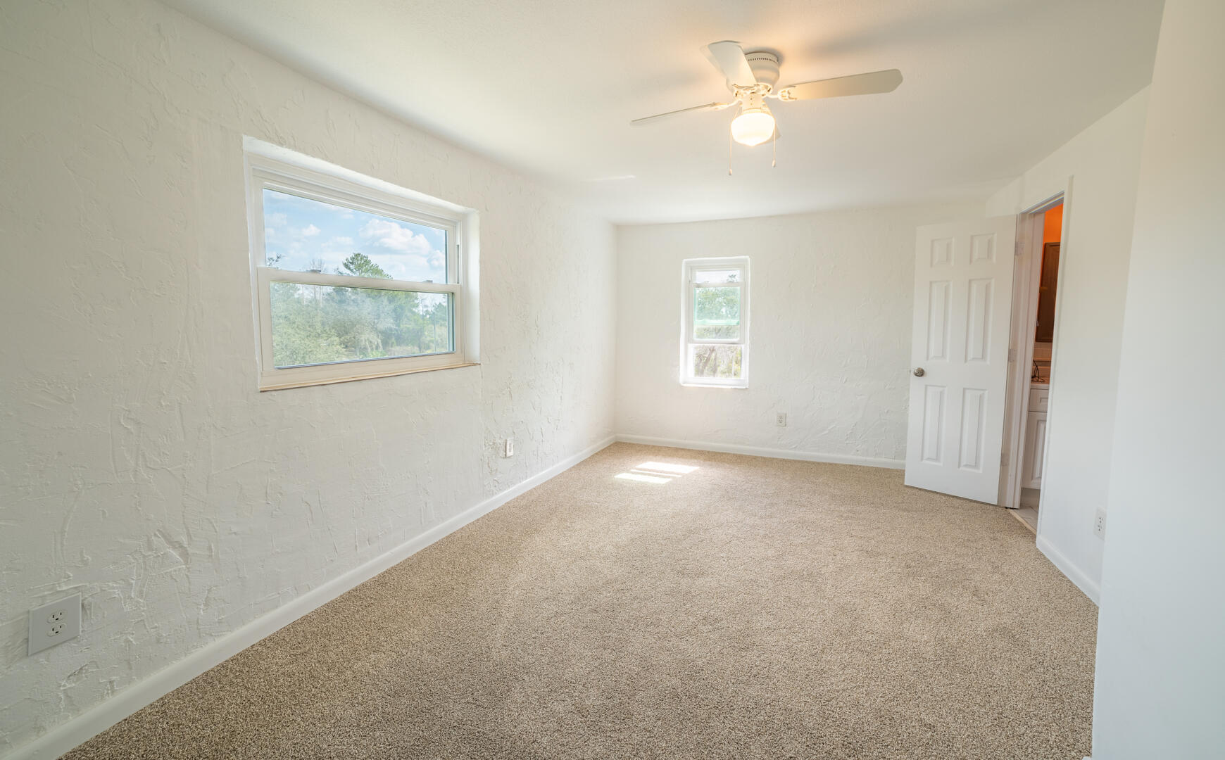 2289 Holder Road Mims, FL 32754 - Photo 10 of 17 a view of an empty room with a window