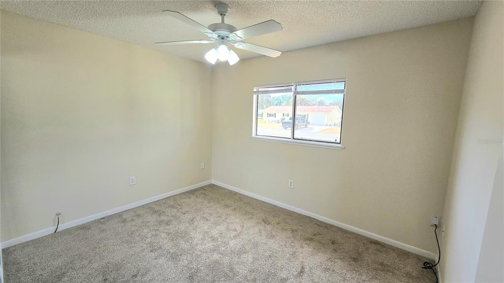 11239 Southwest 77th Court Ocala, FL 34476 - Photo 15 of 22 an empty room with a window