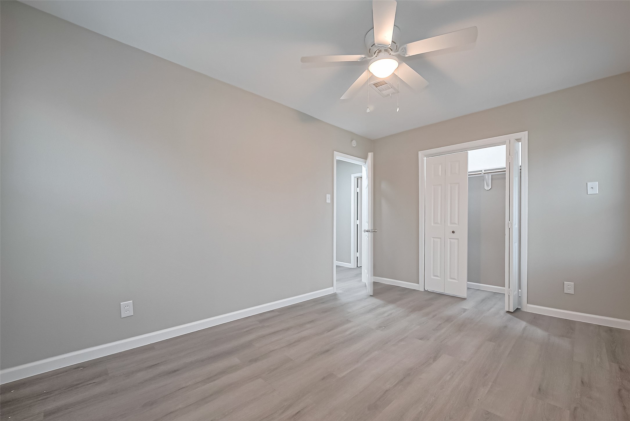 1739-17 West 5th Street Freeport, TX 77541 - Photo 18 of 26 wooden floor in an empty room