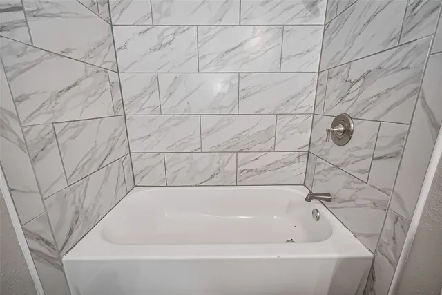 a bathroom with a bathtub