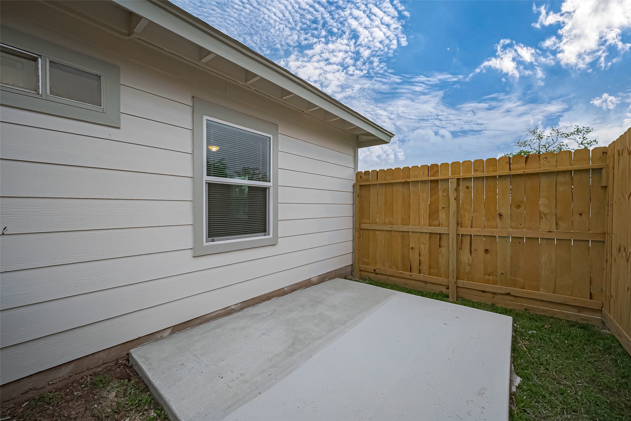 1739-17 West 5th Street Freeport, TX 77541 - Photo 24 of 26 a view of a backyard of a house