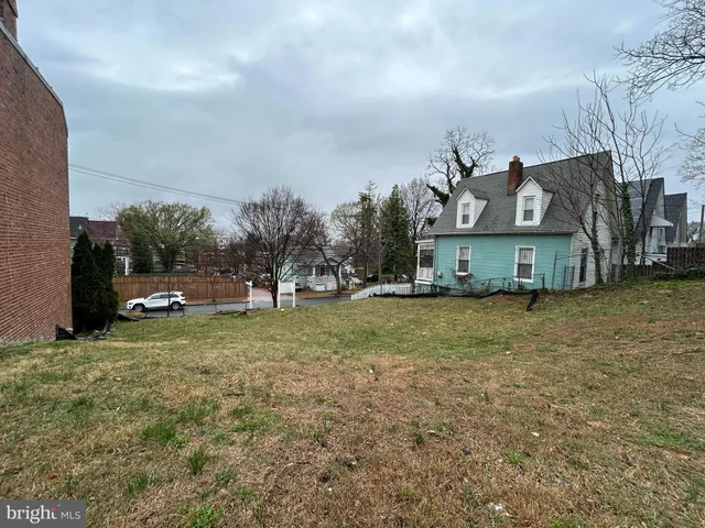 a view of a town with barn house
