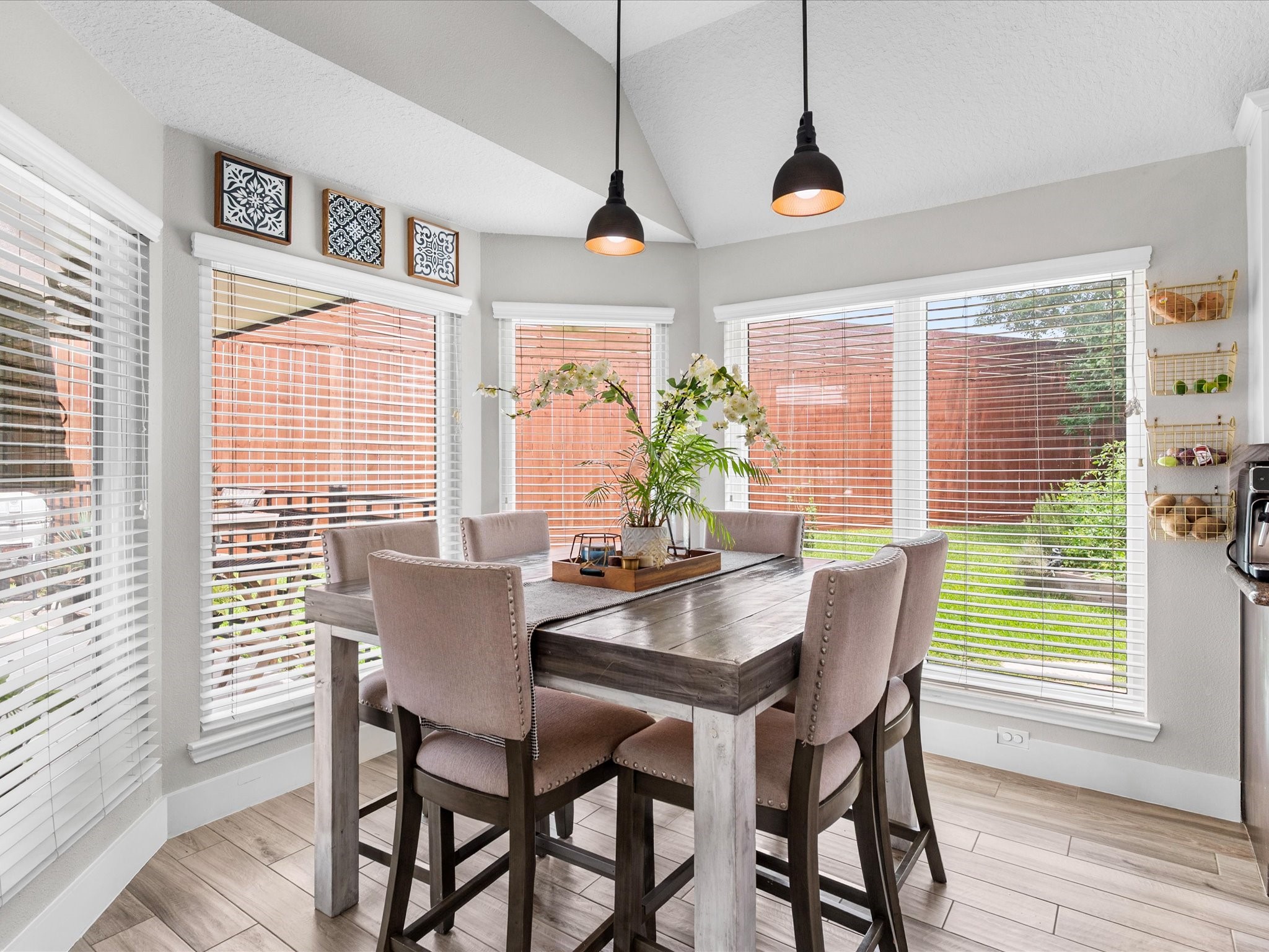 4023 Tigris Ridge Drive Katy, TX 77449 - Photo 17 of 39 A sunny breakfast nook overlooks the backyard, offering the perfect everyday dining experience with natural light pouring in.