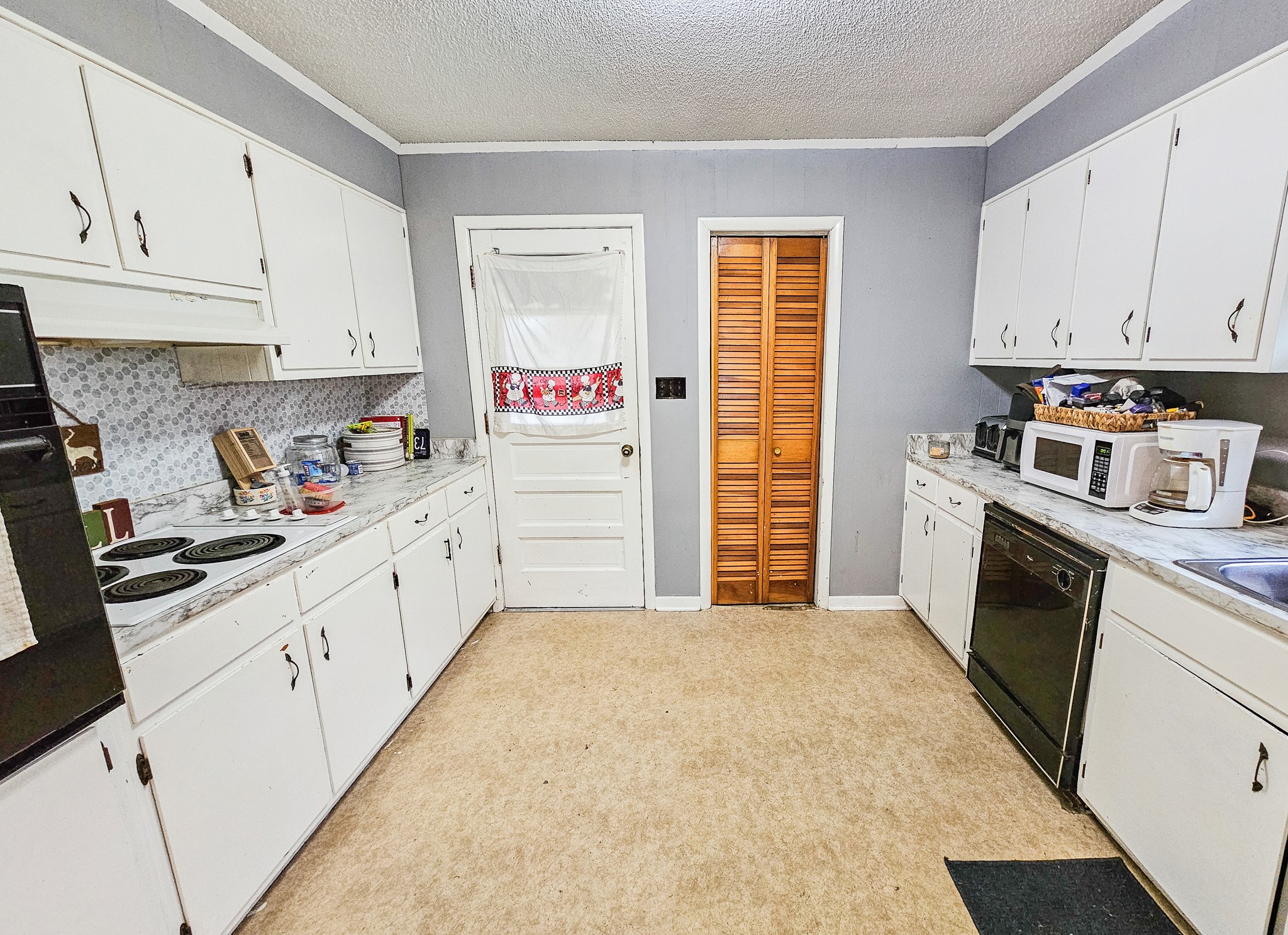 495 Salem Road Minor Hill, TN 38473 - Photo 15 of 30 a kitchen with granite countertop cabinets and appliances