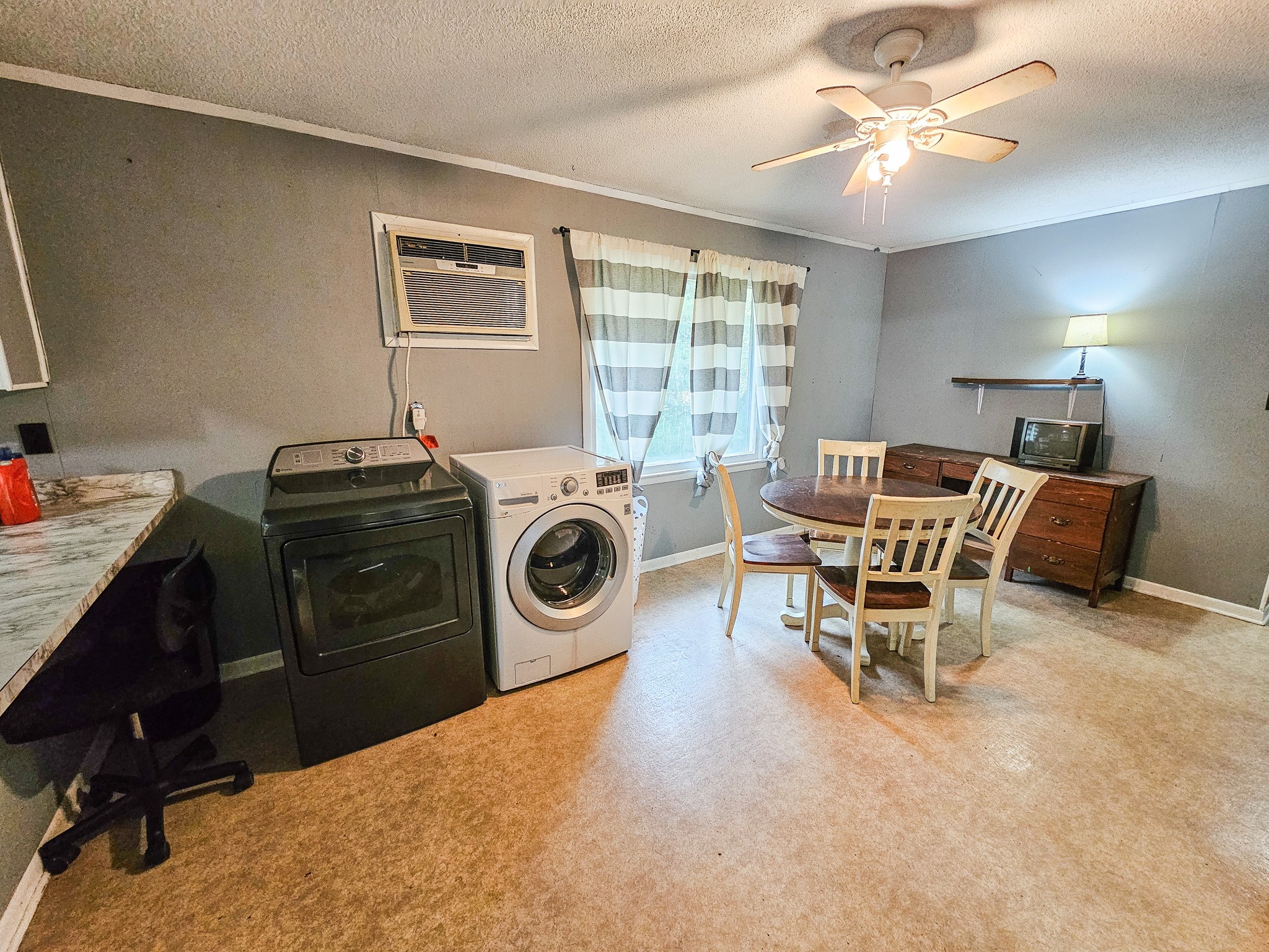 495 Salem Road Minor Hill, TN 38473 - Photo 16 of 30 a view of a workspace with furniture and a window