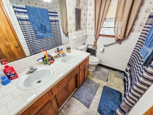 a bathroom with a sink and a bathtub