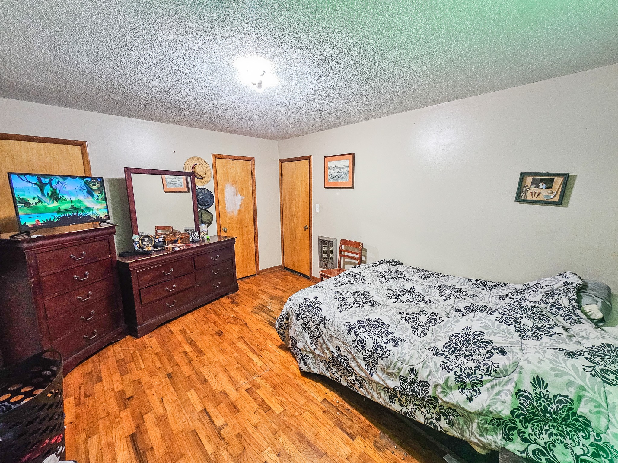 495 Salem Road Minor Hill, TN 38473 - Photo 25 of 30 a bedroom with a bed and a dresser