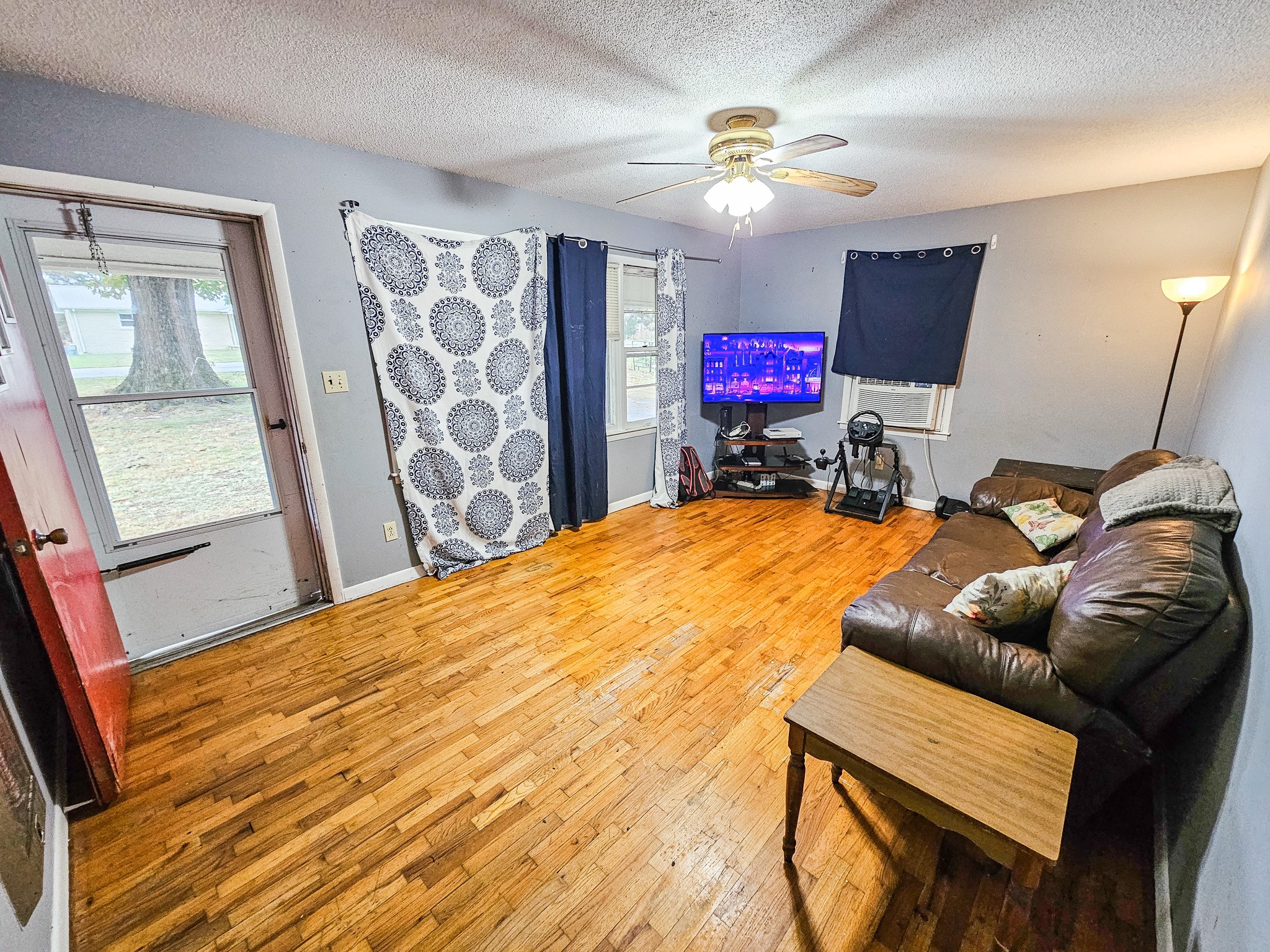 495 Salem Road Minor Hill, TN 38473 - Photo 26 of 30 a room with furniture and a flat screen tv