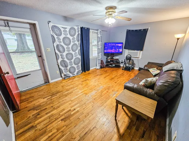 a view of outdoor space with deck and yard