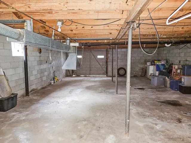 a view of a garage with wooden wall