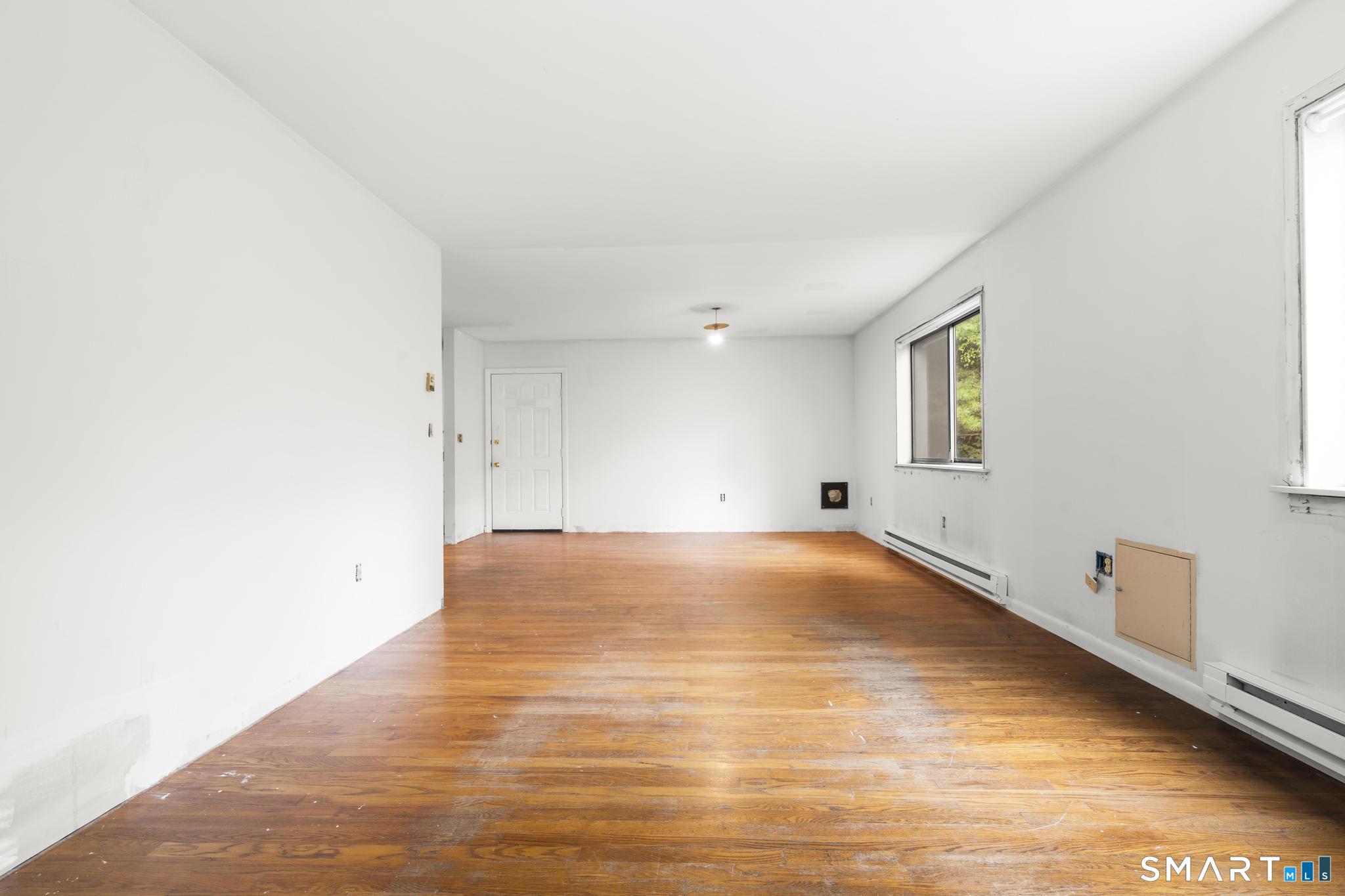 292 Branch Road Thomaston, CT 06787 - Photo 31 of 32 Upper level LR / DR space in need of trim to finish space. Could be in-law space, rental endless possibilities.