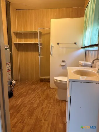 a bathroom with a sink and a toilet
