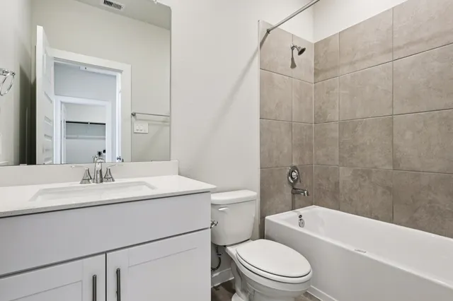 a view of a room with storage and racks on the wall