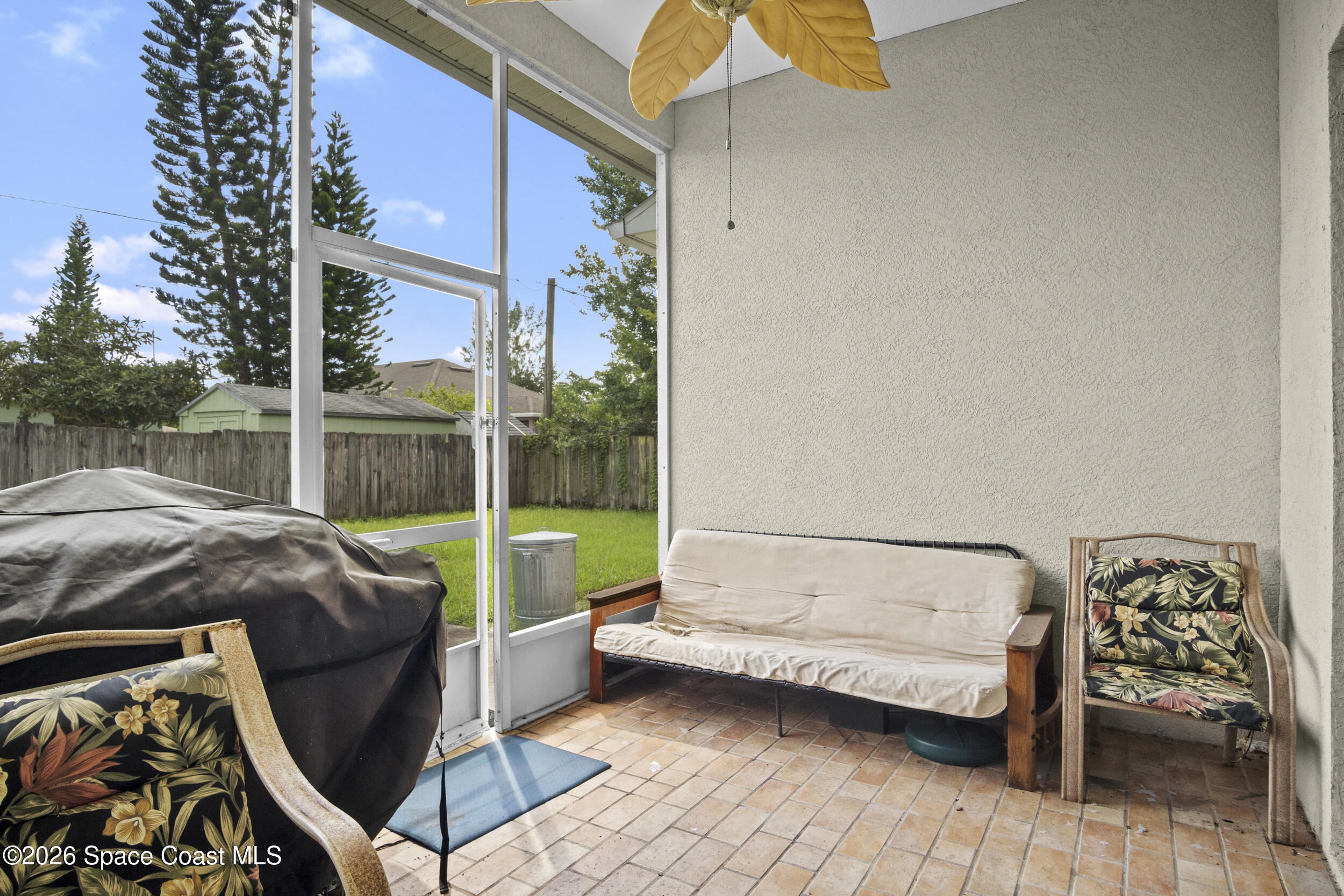 463 Avocado Road Northwest Palm Bay, FL 32907 - Photo 20 of 34 Screened porch