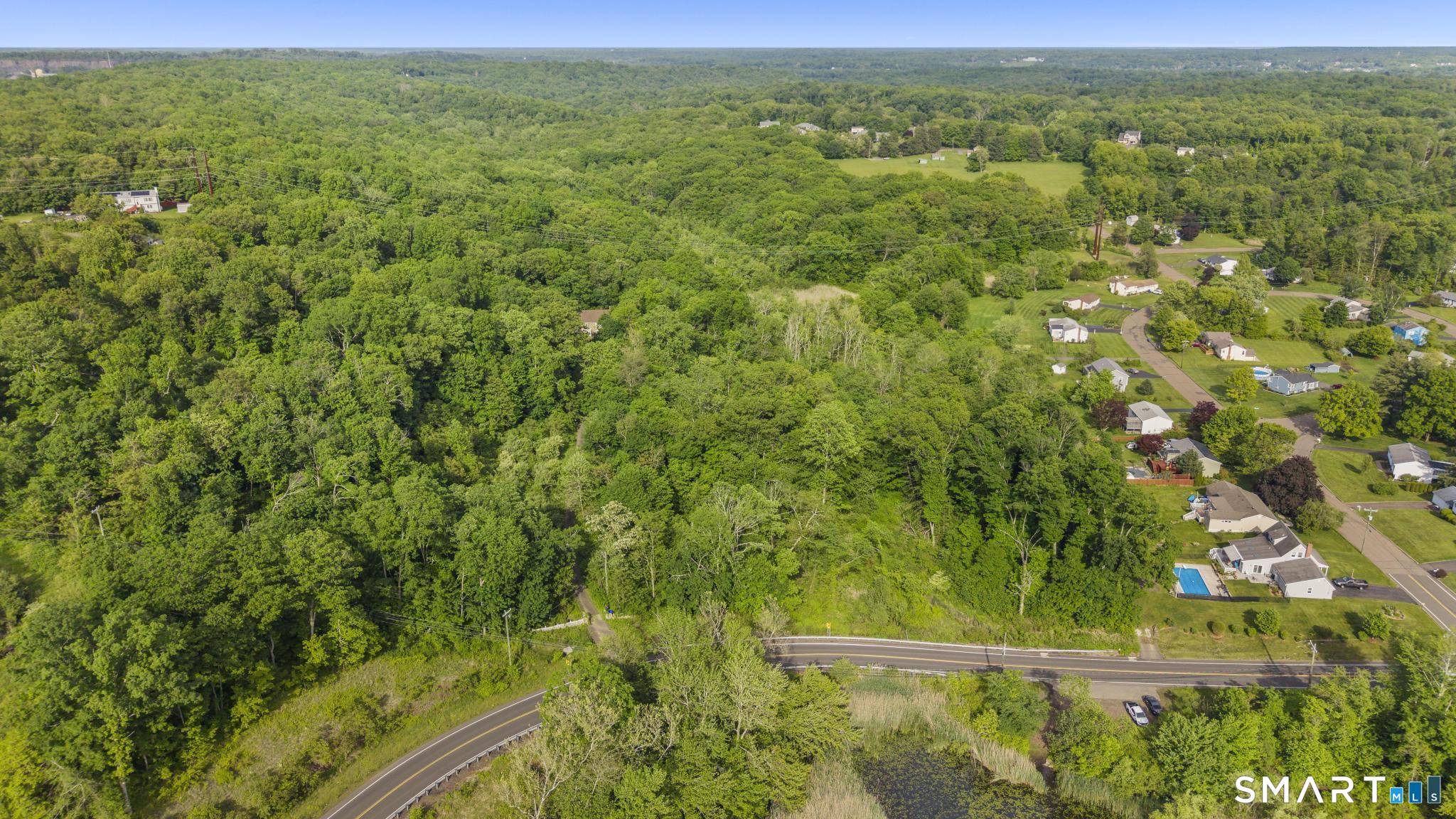 379 Brushy Plain Road Branford, CT 06405 - Photo 5 of 23 a view of a yard with an outdoor seating