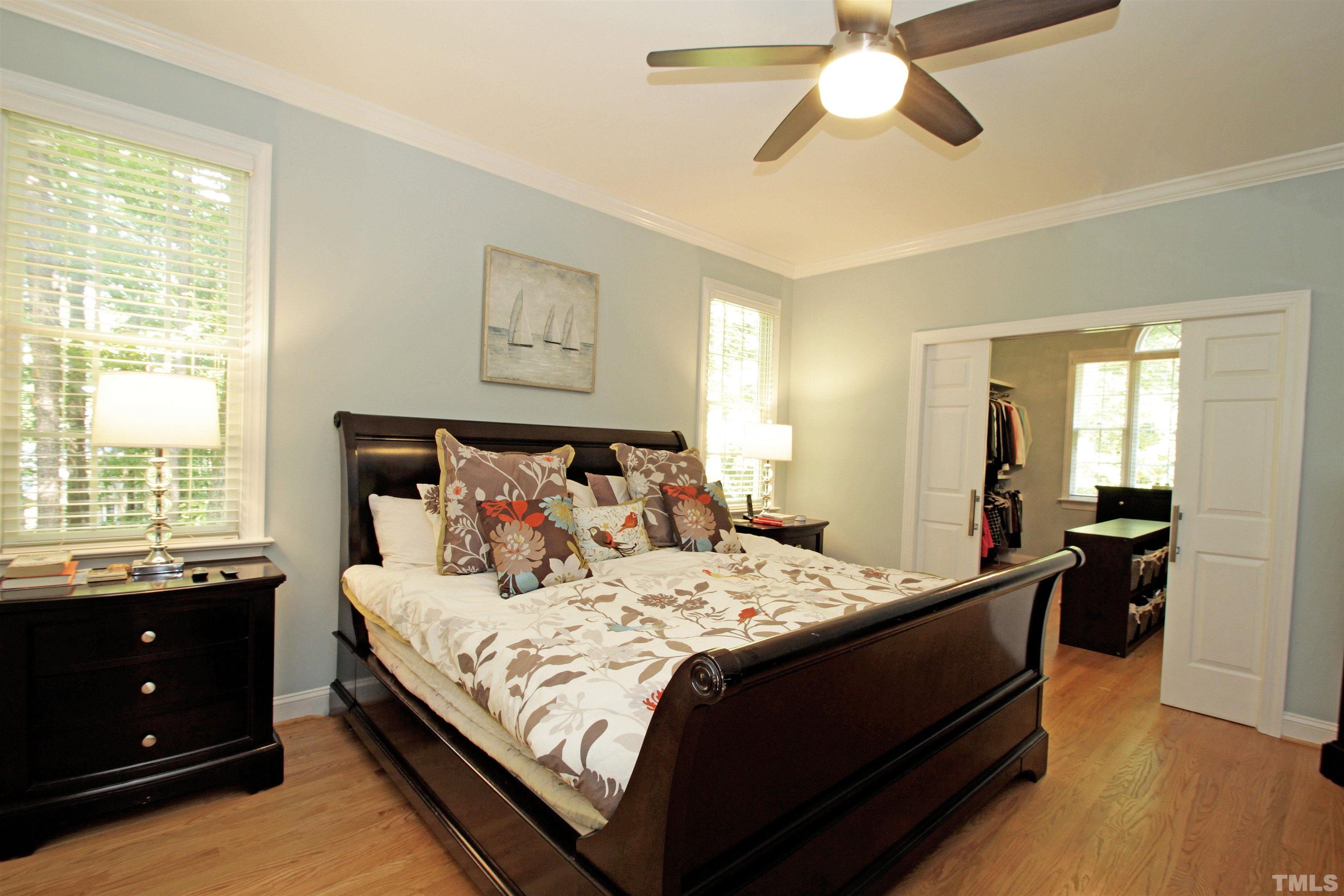 11817 Mountbatten Way Raleigh, NC 27613 - Photo 13 of 28 a bedroom with a bed and a window