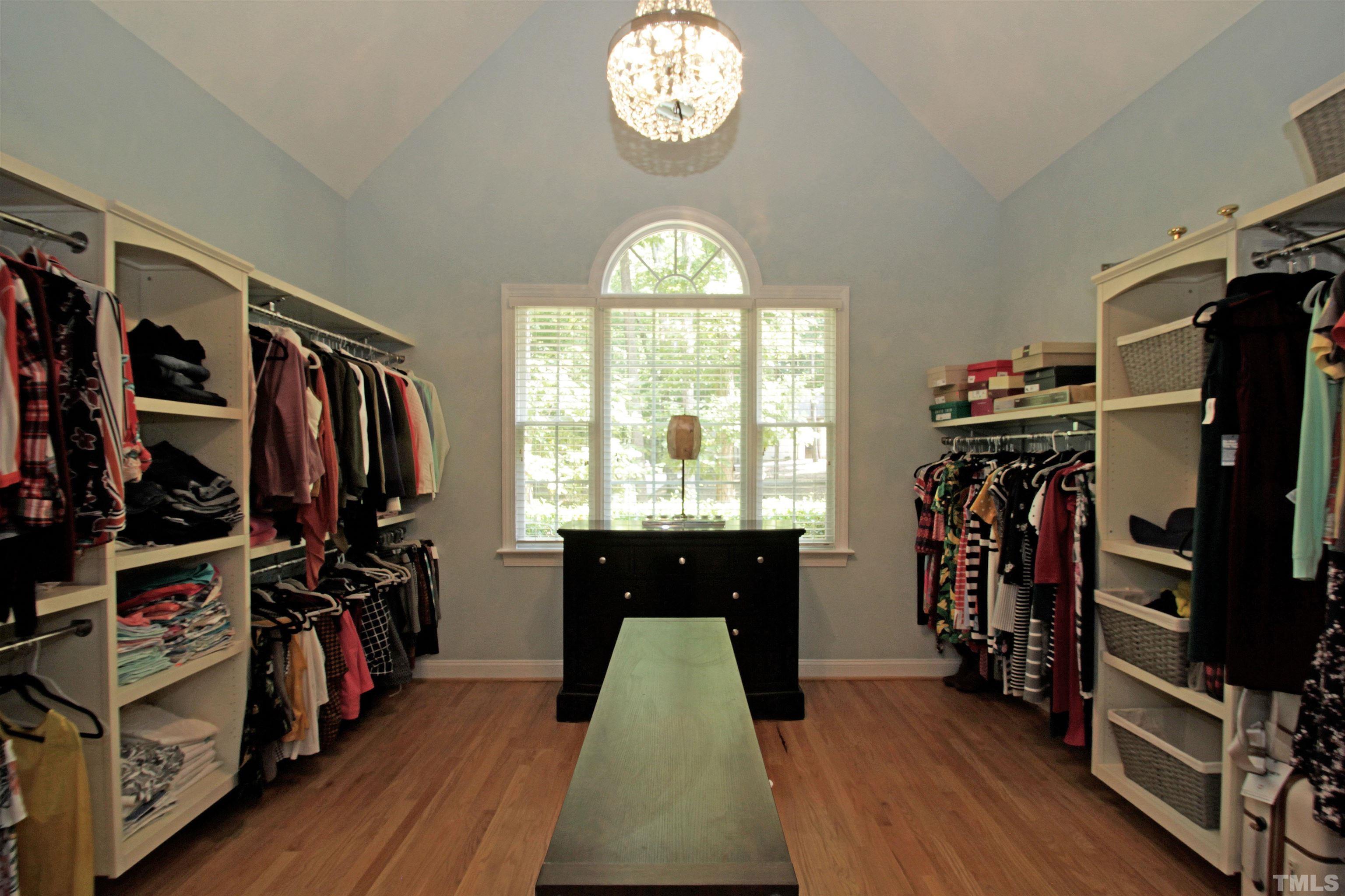 11817 Mountbatten Way Raleigh, NC 27613 - Photo 16 of 28 a view of a entryway with wooden floor and windows