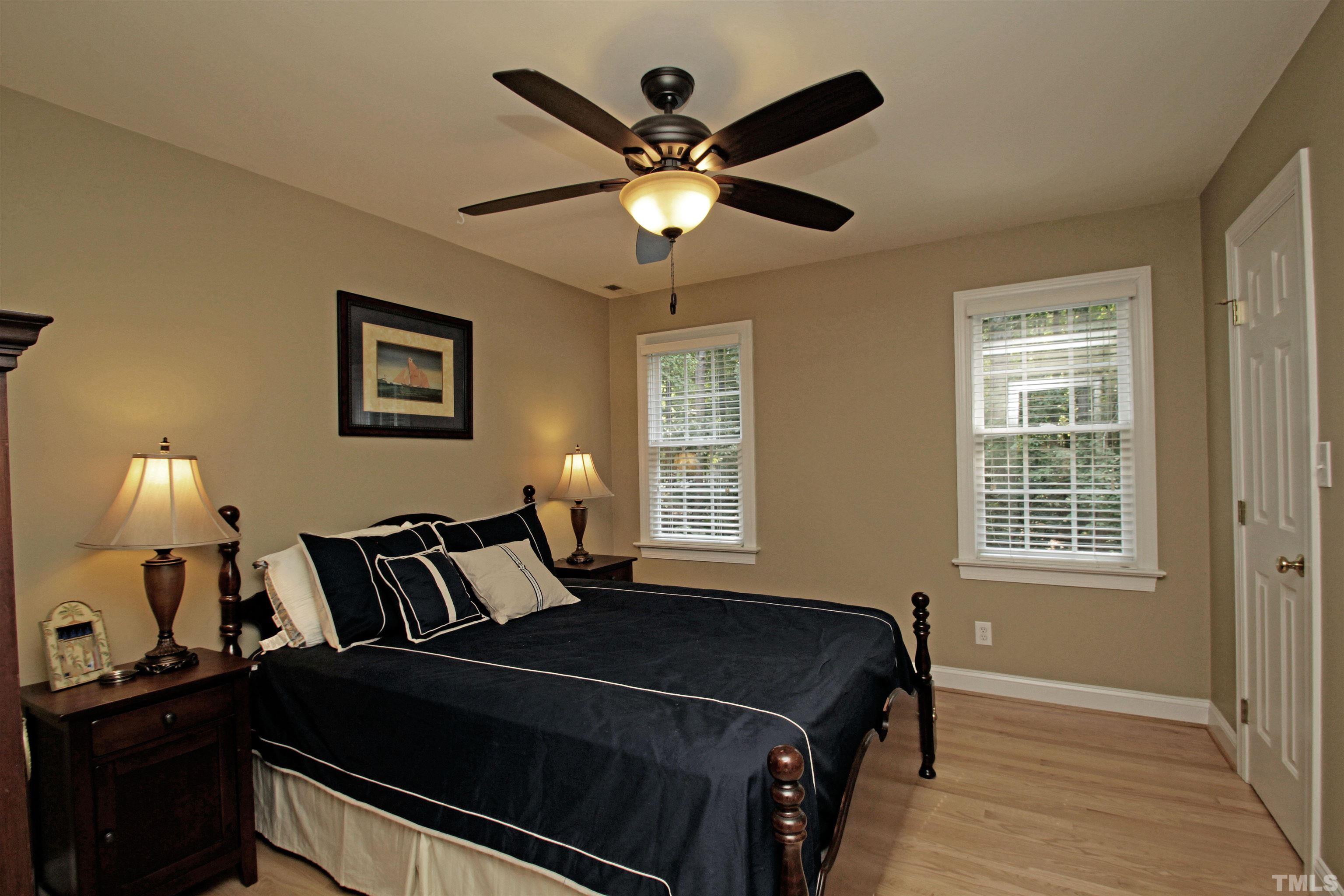 11817 Mountbatten Way Raleigh, NC 27613 - Photo 20 of 28 a bedroom with a bed and a window