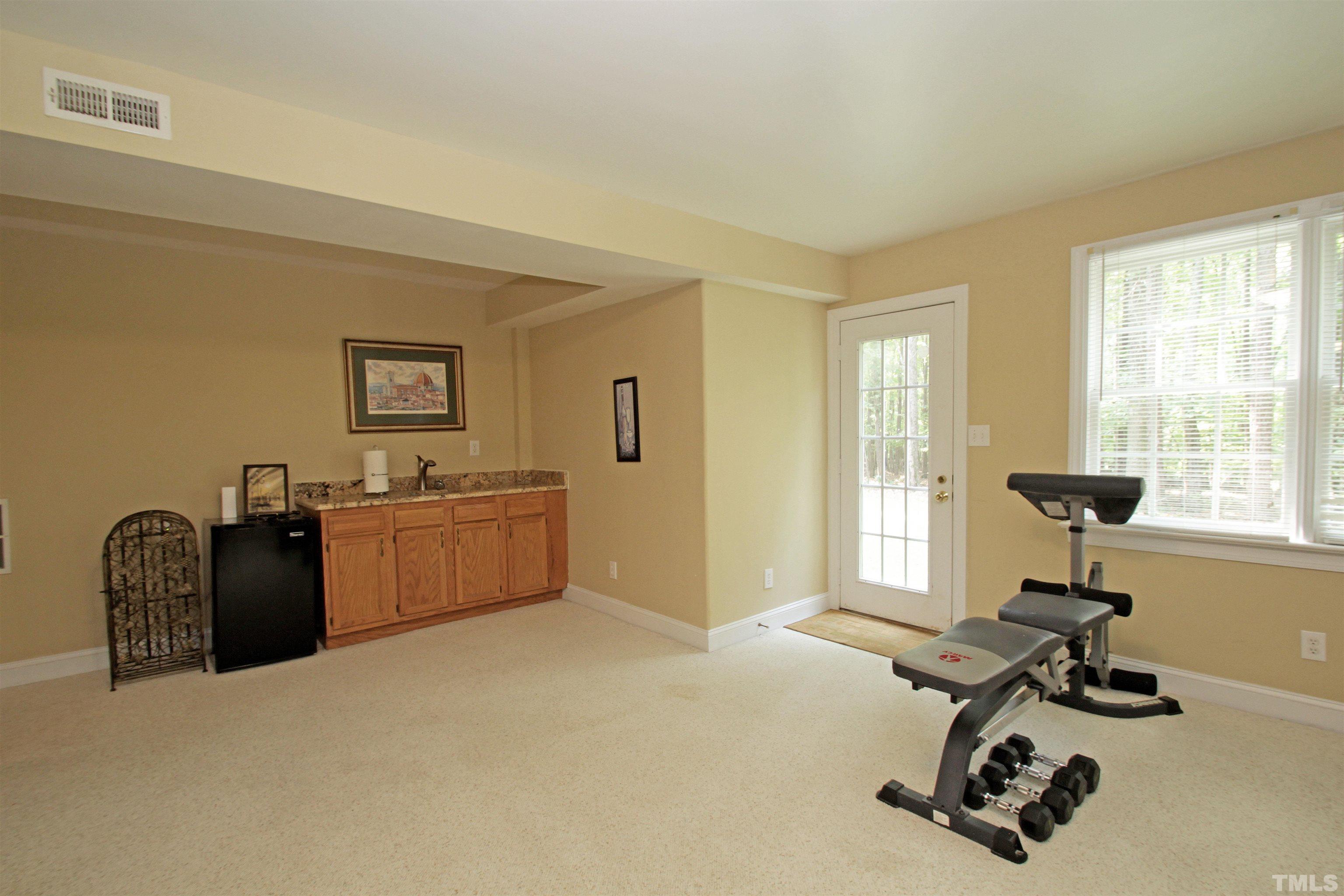 11817 Mountbatten Way Raleigh, NC 27613 - Photo 24 of 28 a view of a livingroom with workspace and a window