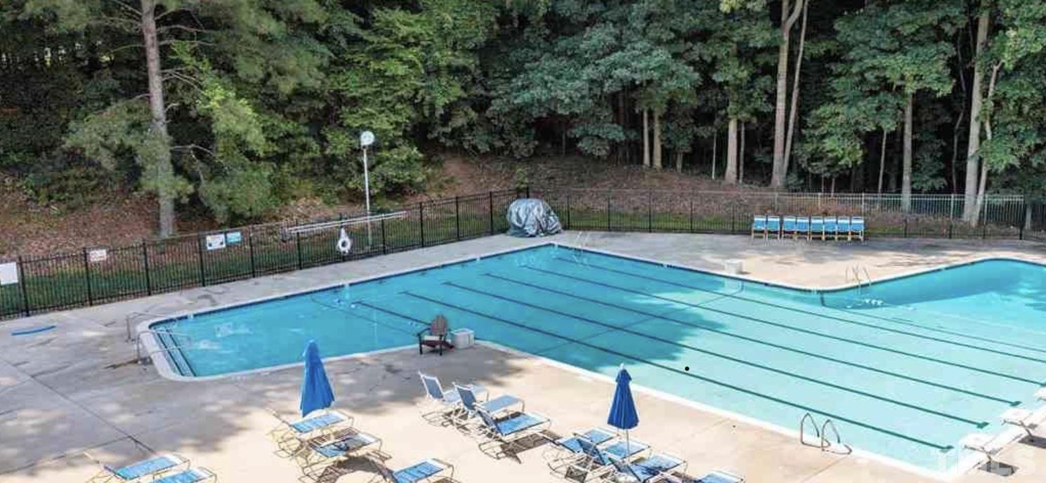 11817 Mountbatten Way Raleigh, NC 27613 - Photo 27 of 28 a view of a wooden deck with chairs