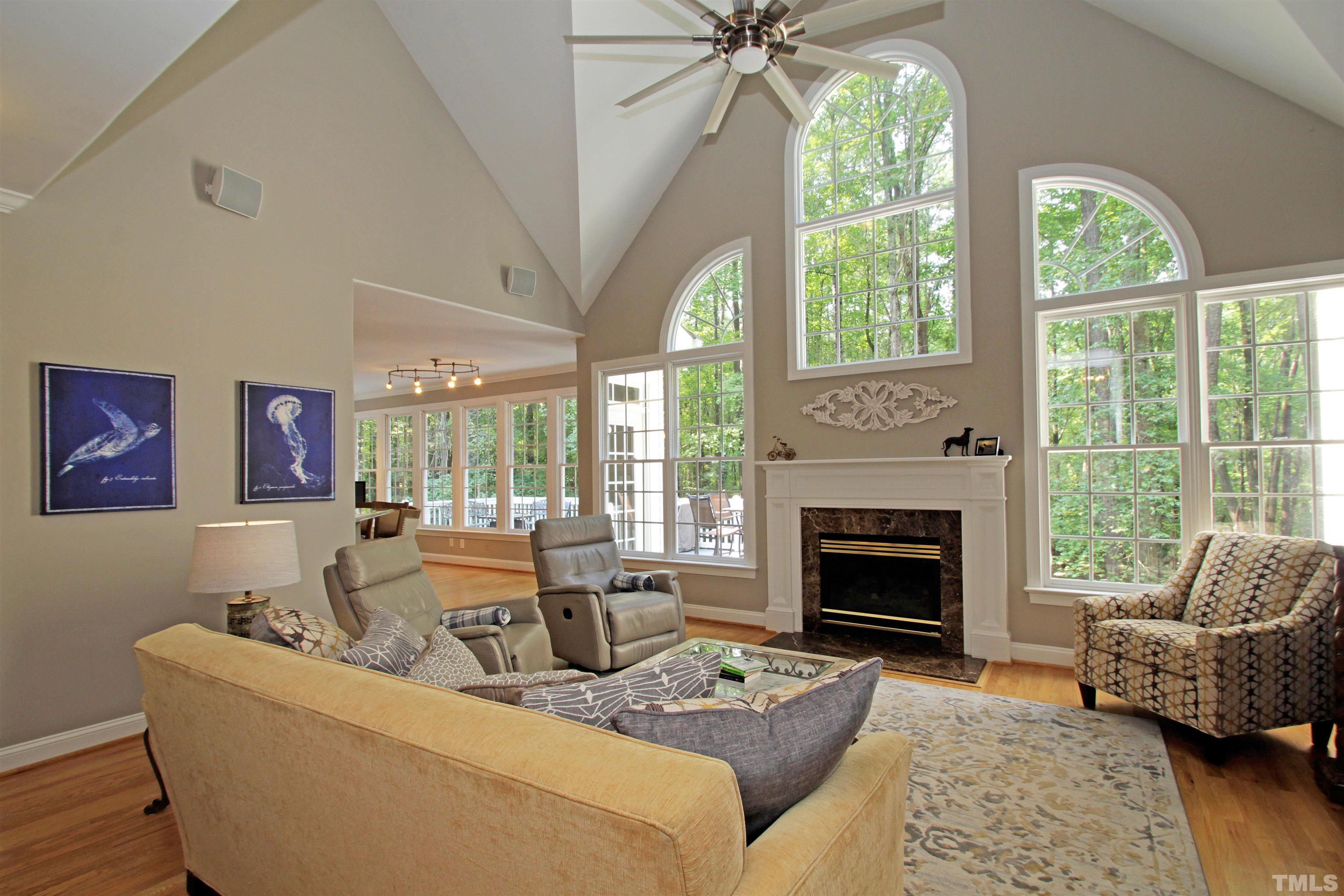 11817 Mountbatten Way Raleigh, NC 27613 - Photo 7 of 28 a living room with furniture and a fireplace