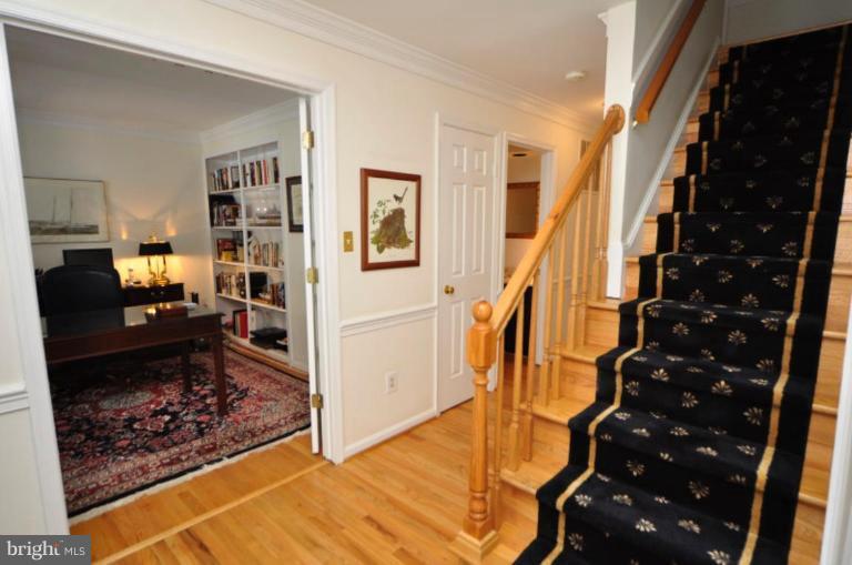 11604 Deer Forest Road Reston, VA 20194 - Photo 8 of 22 Hardwood Foyer, Stairs and Upper Hallway