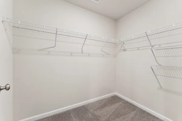 a view of a room with racks on the wall