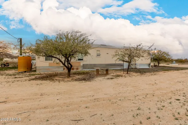 a view of kitchen with stainless steel appliances refrigerator stove and microwave