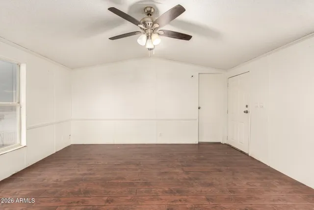 a kitchen with a sink a stove a refrigerator and a stove