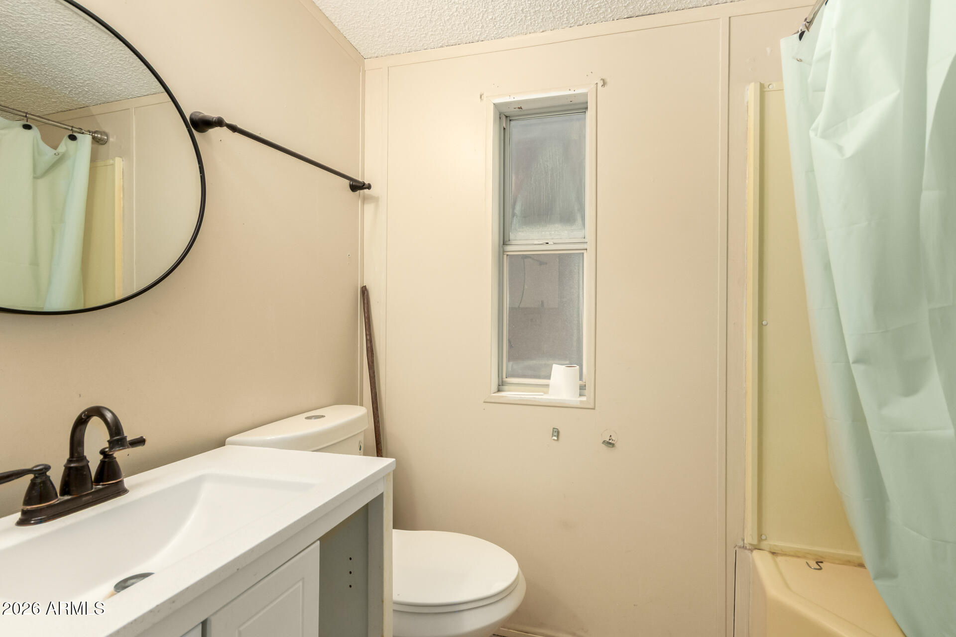 54194 West Organ Pipe Road Maricopa, AZ 85139 - Photo 22 of 52 a bathroom with a granite countertop sink toilet and a mirror