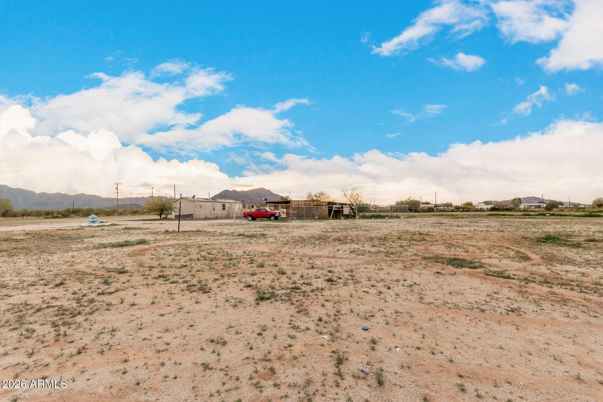 54194 West Organ Pipe Road Maricopa, AZ 85139 - Photo 45 of 52 a view of lake with mountain