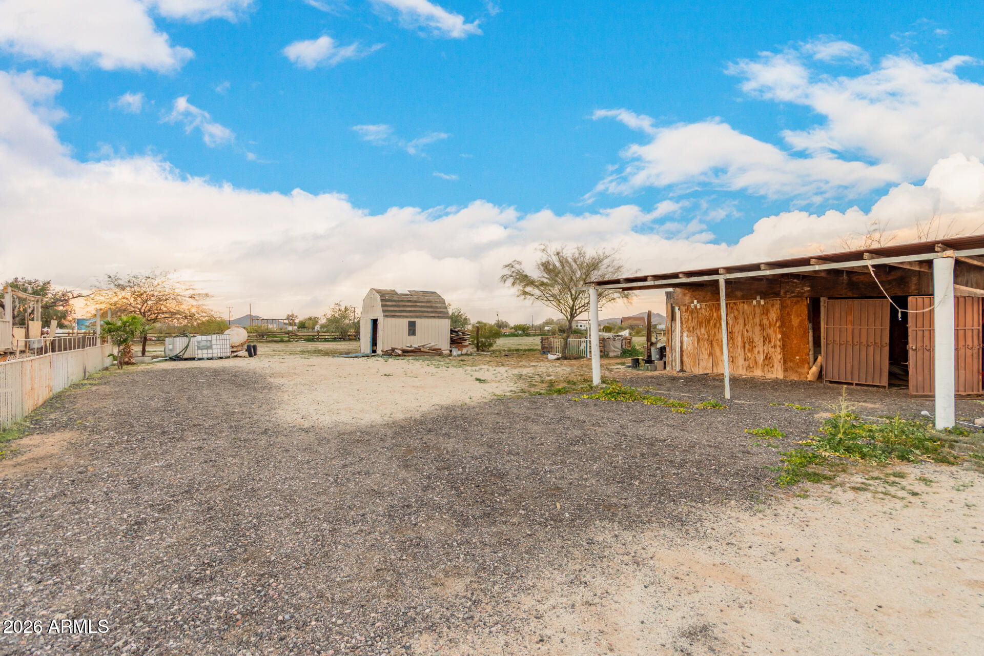 54194 West Organ Pipe Road Maricopa, AZ 85139 - Photo 46 of 52 a view of a house with a yard
