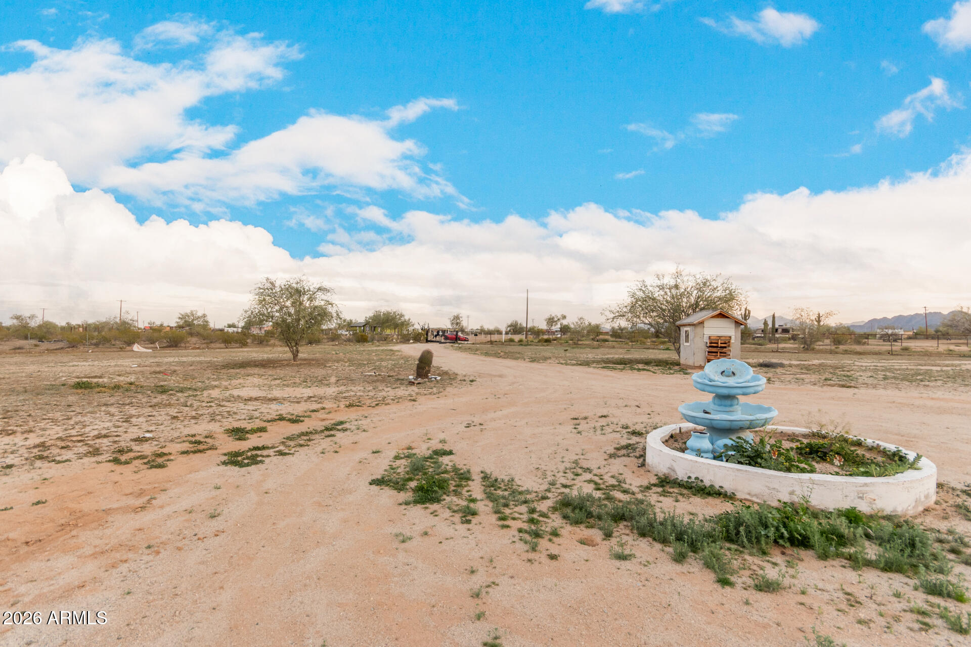 54194 West Organ Pipe Road Maricopa, AZ 85139 - Photo 52 of 52 a view of a lake with a beach