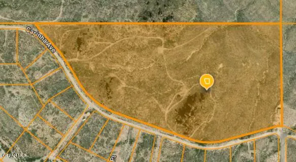 a view of a city with mountains in the background