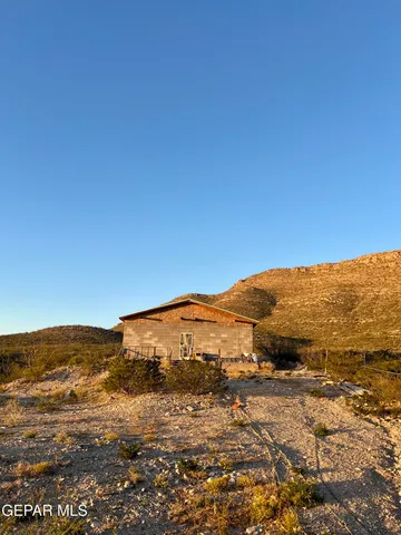 a view of a backyard of the house