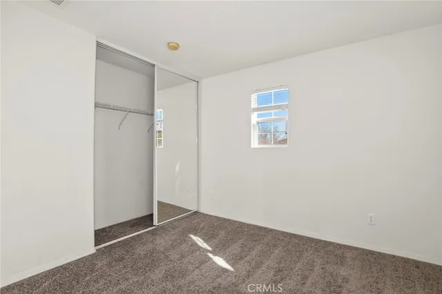 a view of a backyard of the house