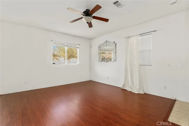 a kitchen with stainless steel appliances granite countertop a refrigerator oven a sink and a refrigerator