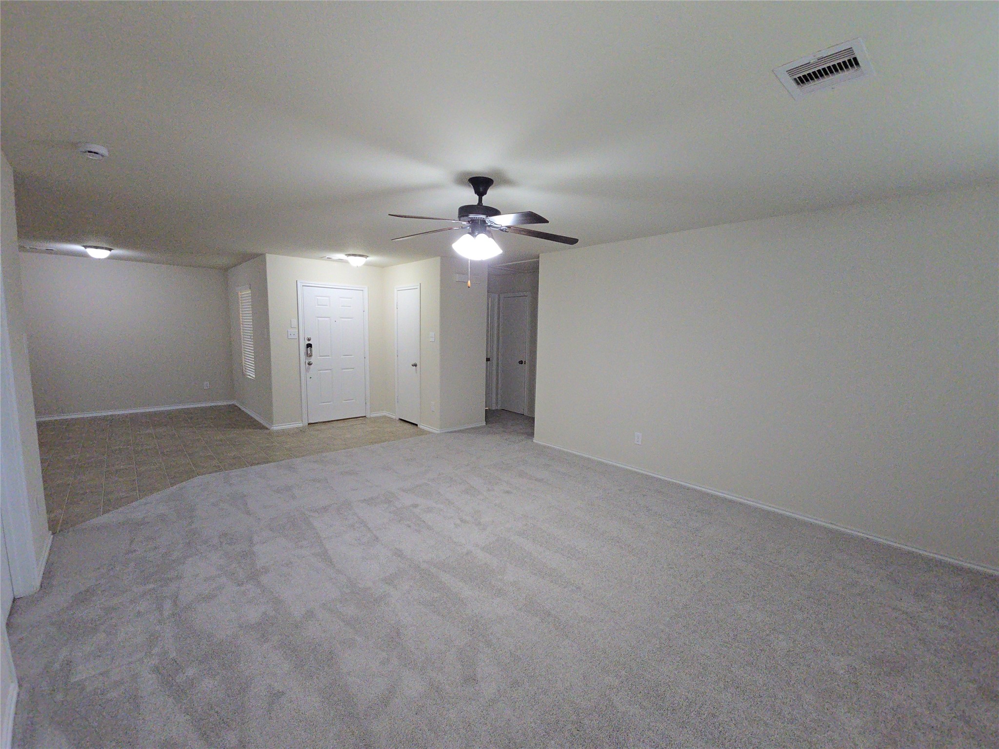 810 Lightningbug Lane Conroe, TX 77301 - Photo 2 of 27 a view of an empty room