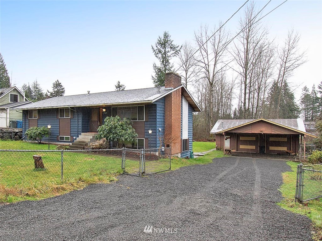 17371 Southeast 133rd Street Renton, WA 98059 - Photo 2 of 22 a front view of a house with garden