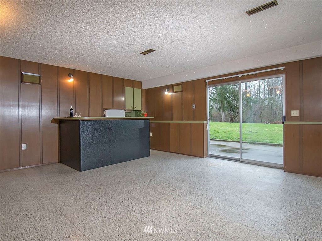 17371 Southeast 133rd Street Renton, WA 98059 - Photo 18 of 22 a view of a kitchen with a sink and cabinets