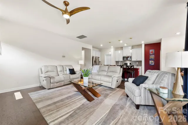 a living room with furniture and a couch