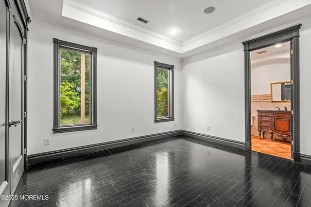 a view of living room with furniture and flat screen tv
