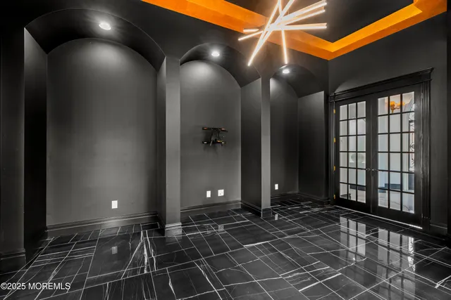 a view of a room with a table and a chair