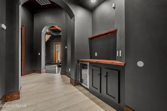 wooden floor in an empty room with window