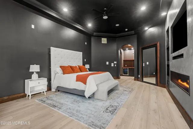 a view of a room with window and wooden floor