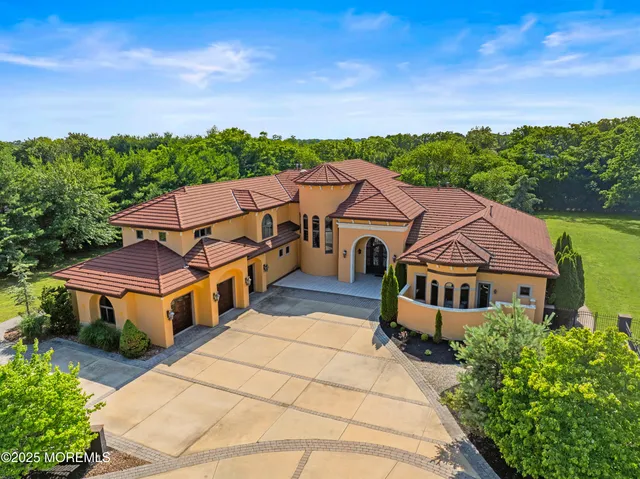 a view of living room with furniture and window
