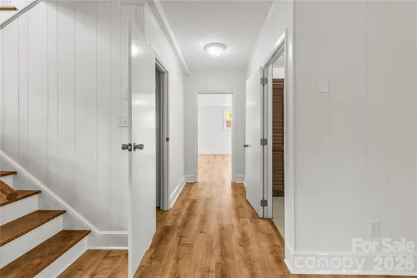 a view of a bathroom from the hallway